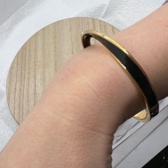 Kate Spade New York Black Enamel and Gold Tone Wave Twist Bangle Bracelet - Picture 7 of 11